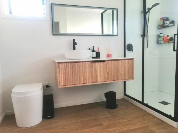 Sun-Mart GTG Composting Toilet in NZ bathroom